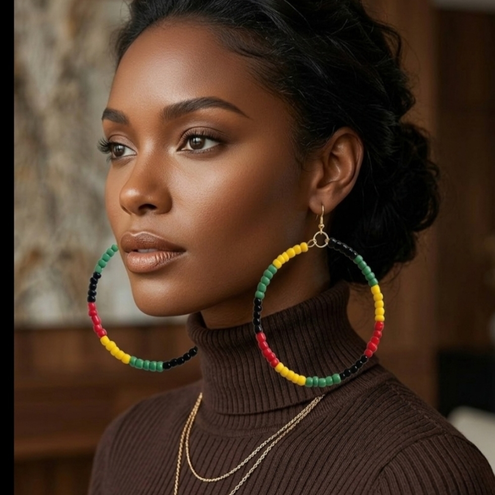 Handmade hoop earrings with African-inspired seed beads in red, yellow, green